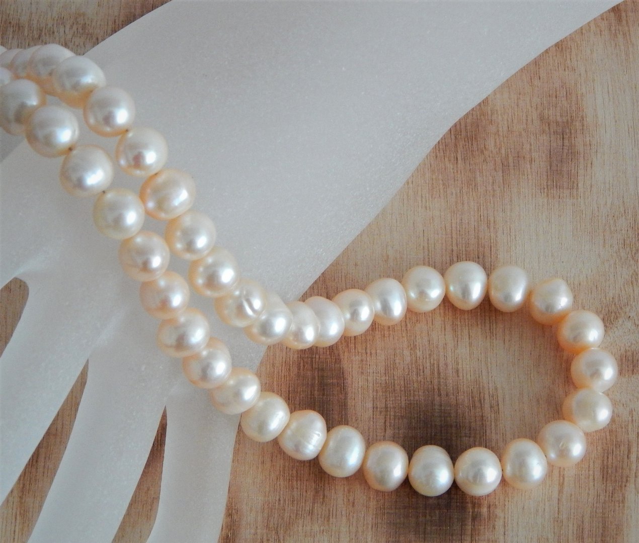  Perlenkette rose ca. 8mm A semi-rund 
