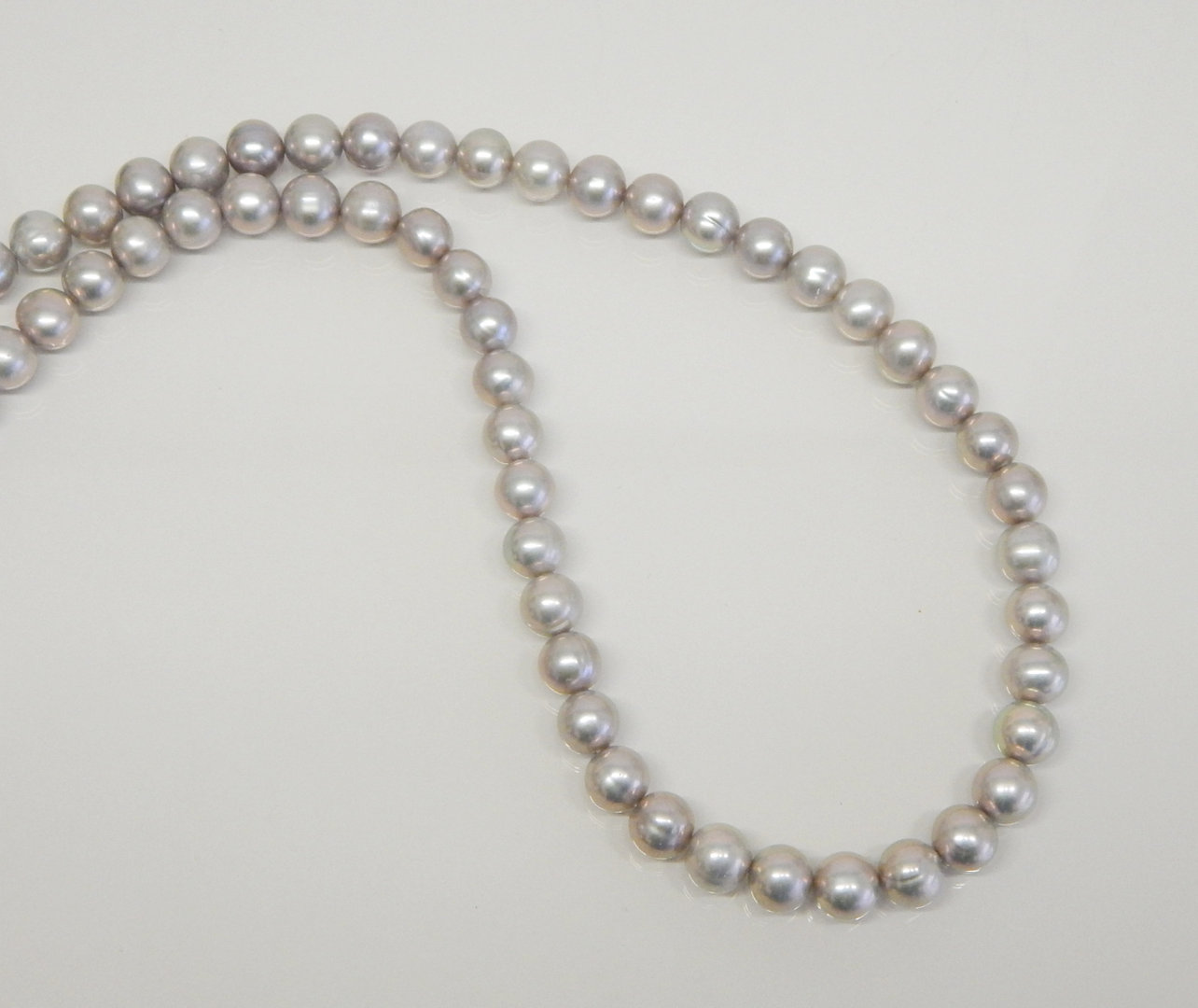  Perlenkette grau ca. 8mm AAA semi-rund 