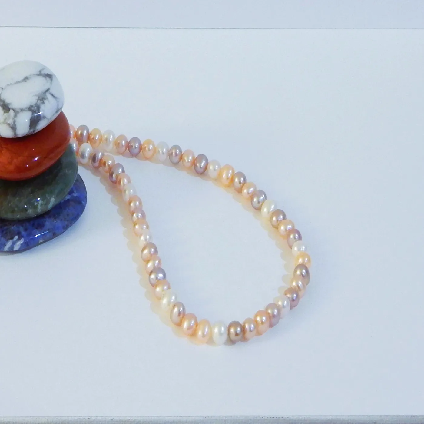 Perlenkette multicolor ca. 5-5,5mm AAA semi-rund