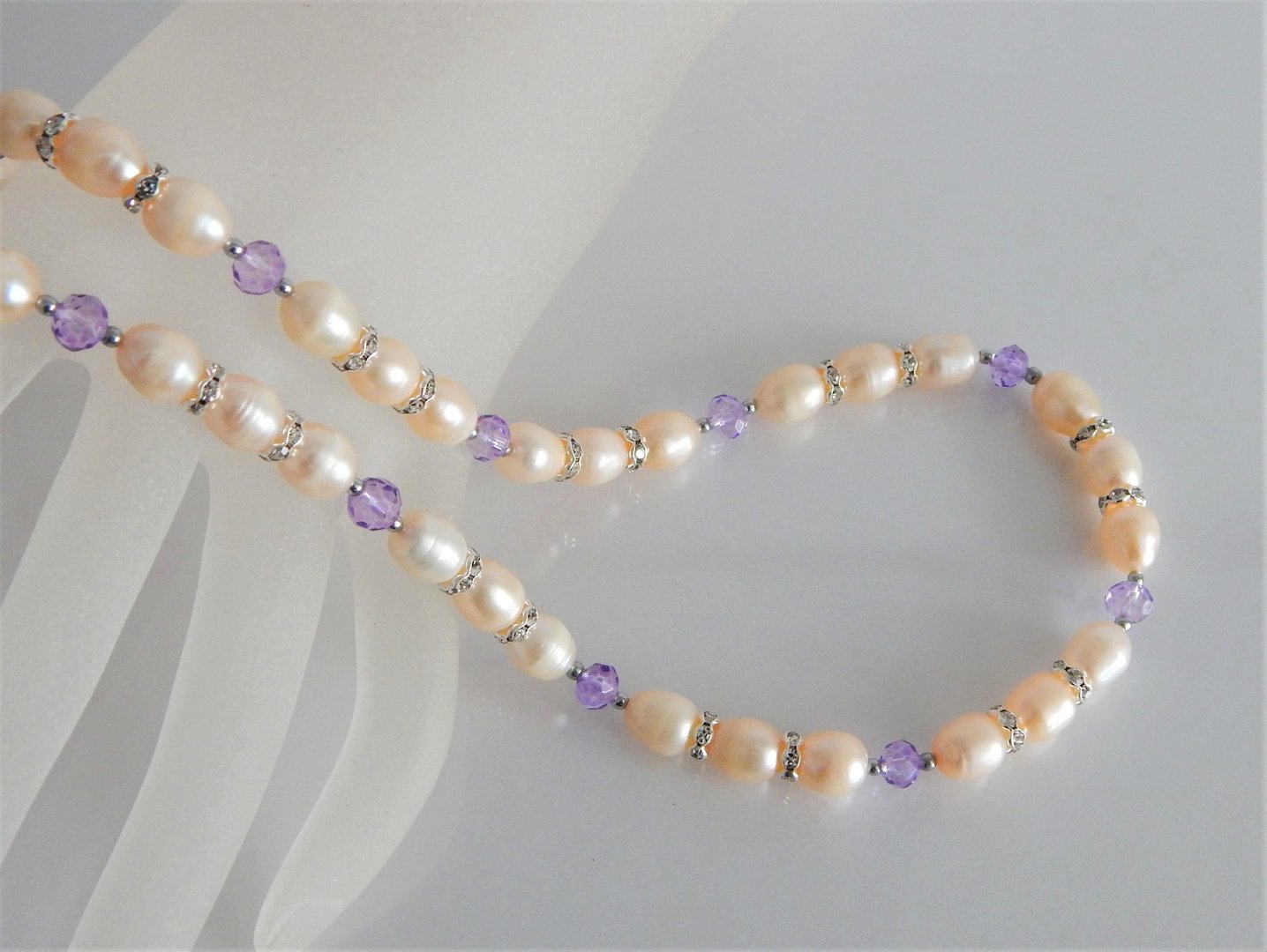 Perlenkette rose ca. 9x6mm A mit Kristalle und Rondelle