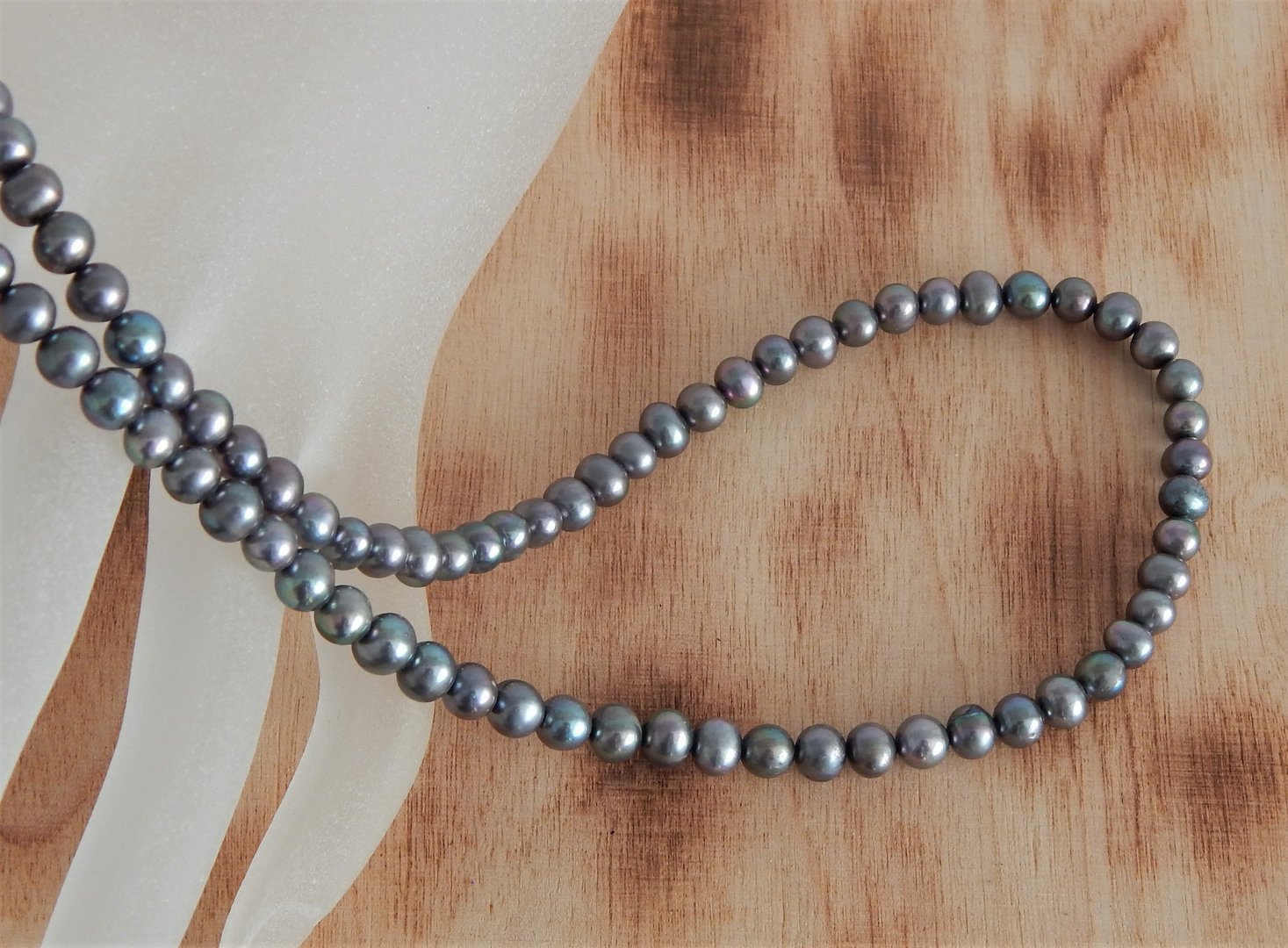 Perlenkette tahitigrau ca. 6mm A semi-rund